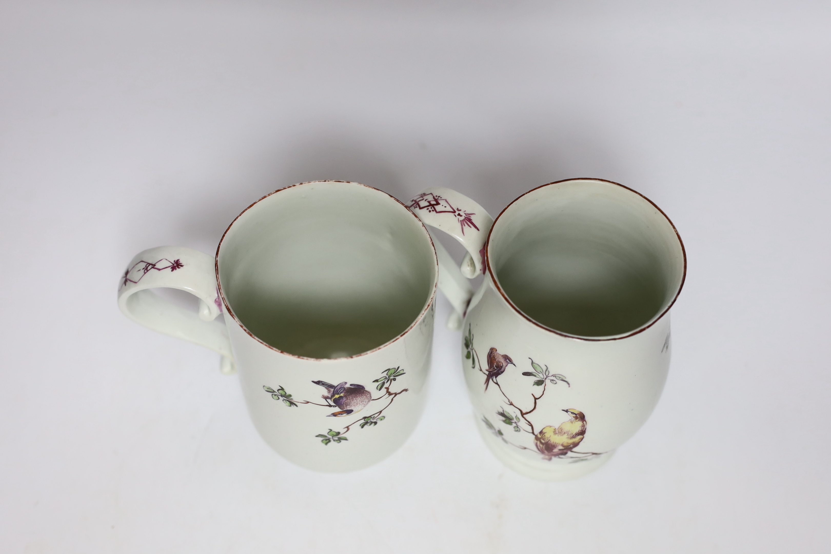 Two Derby mugs, c.1760-65, decorated with birds, tallest 14cm